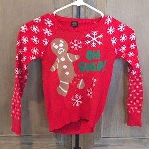 Lightly used red and white Christmas sweater.